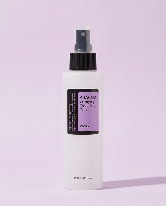 COSRX AHA BHA Clarifying Treatment Toner 150ml - clear spray bottle with a black cap on a lilac background