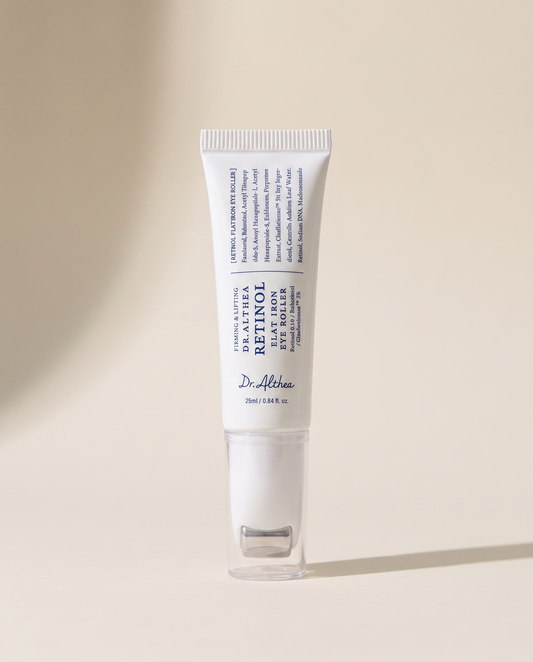 Dr.Althea Retinol Eye Roller 25ml - small tube with a metal roller tip on a cream background