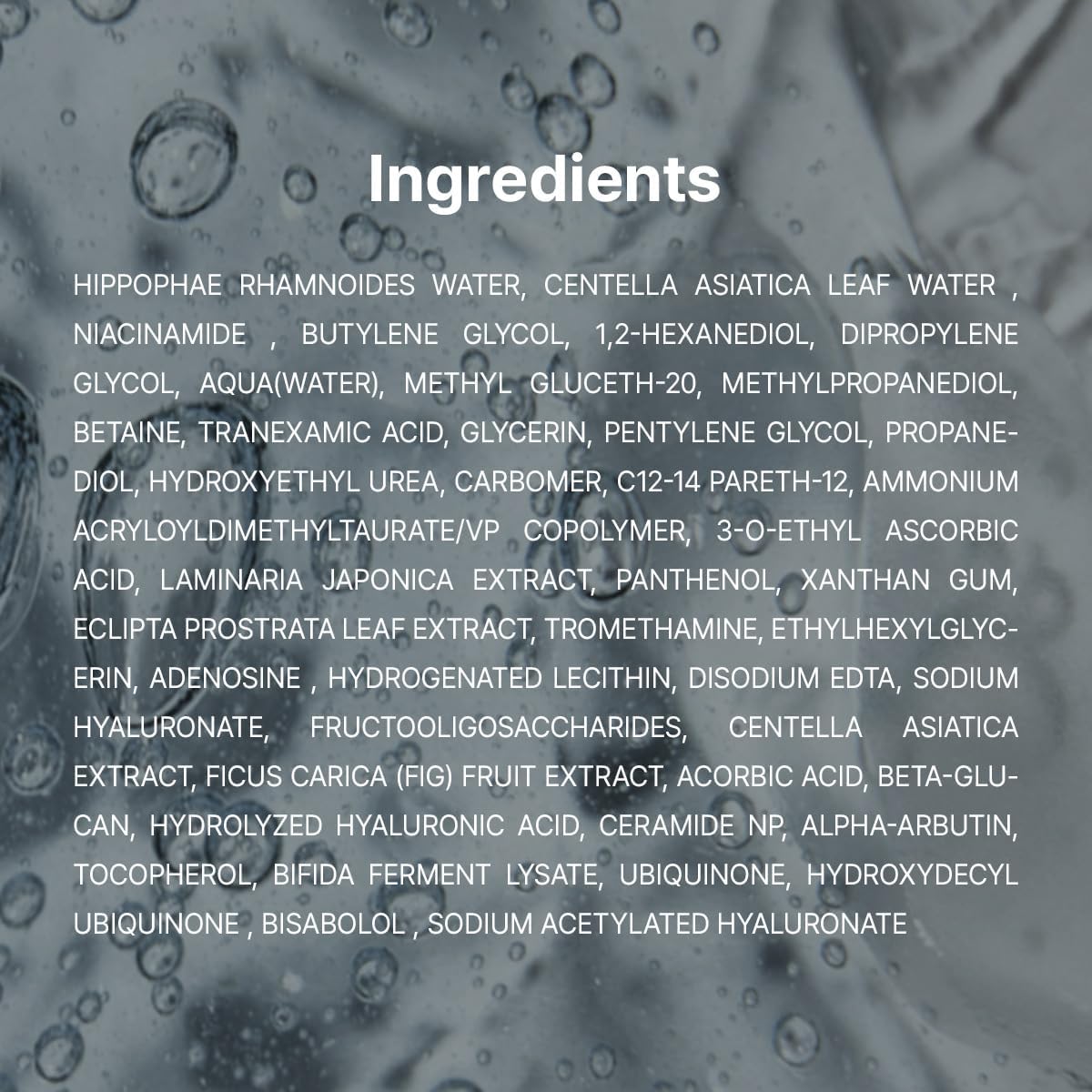 Full ingredients list for the Vitamin C Boosting Serum on a grey water background