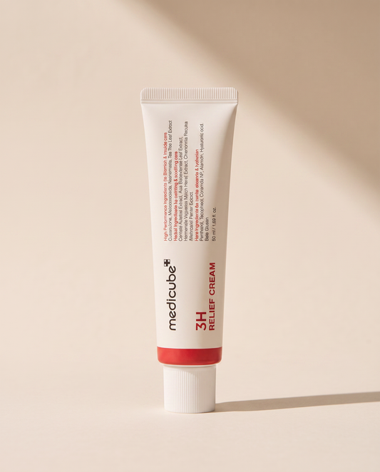 Medicube 3H Relief Cream 50ml - white tube standing on a warm beige background