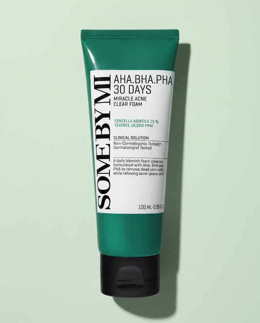 Some By Mi AHA BHA PHA Miracle Acne Foam 100ml - dark green cleanser tube on a pale green background