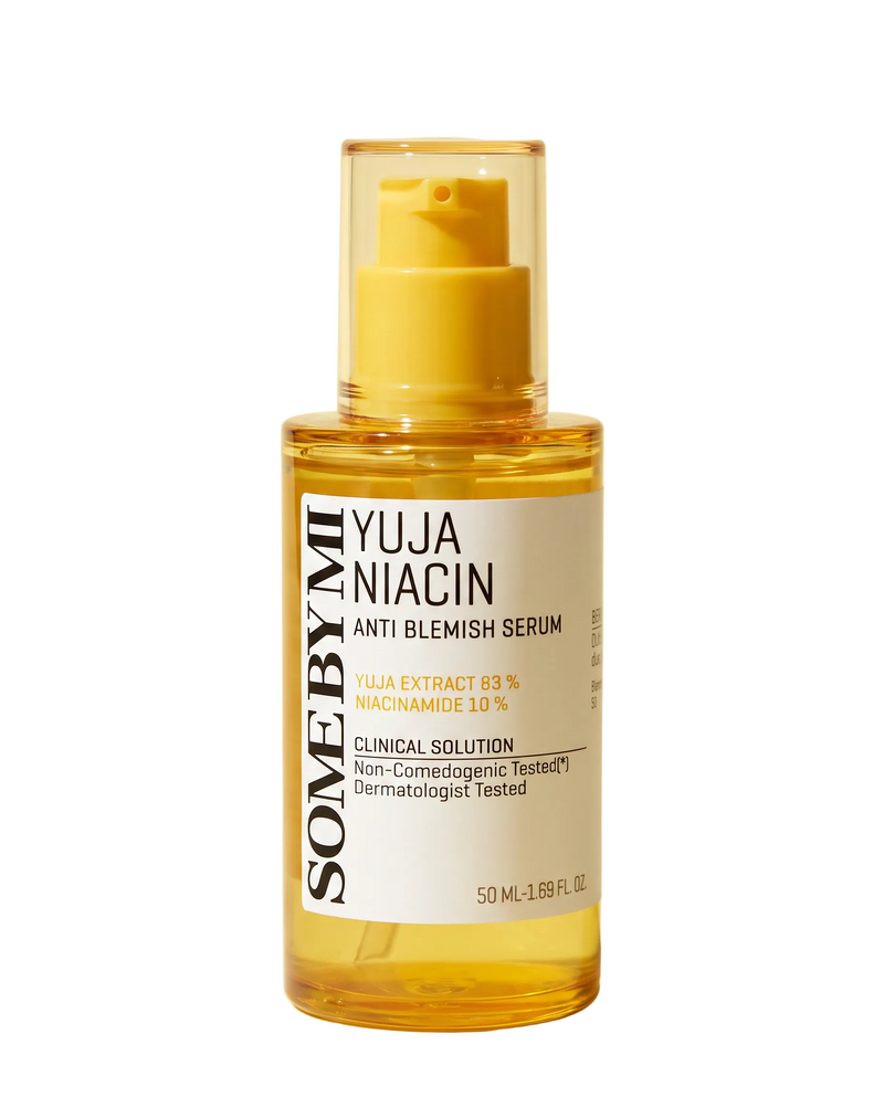Some By Mi Yuja Niacin Anti-Blemish Serum 50ml - yellow serum pump bottle on a cream background
