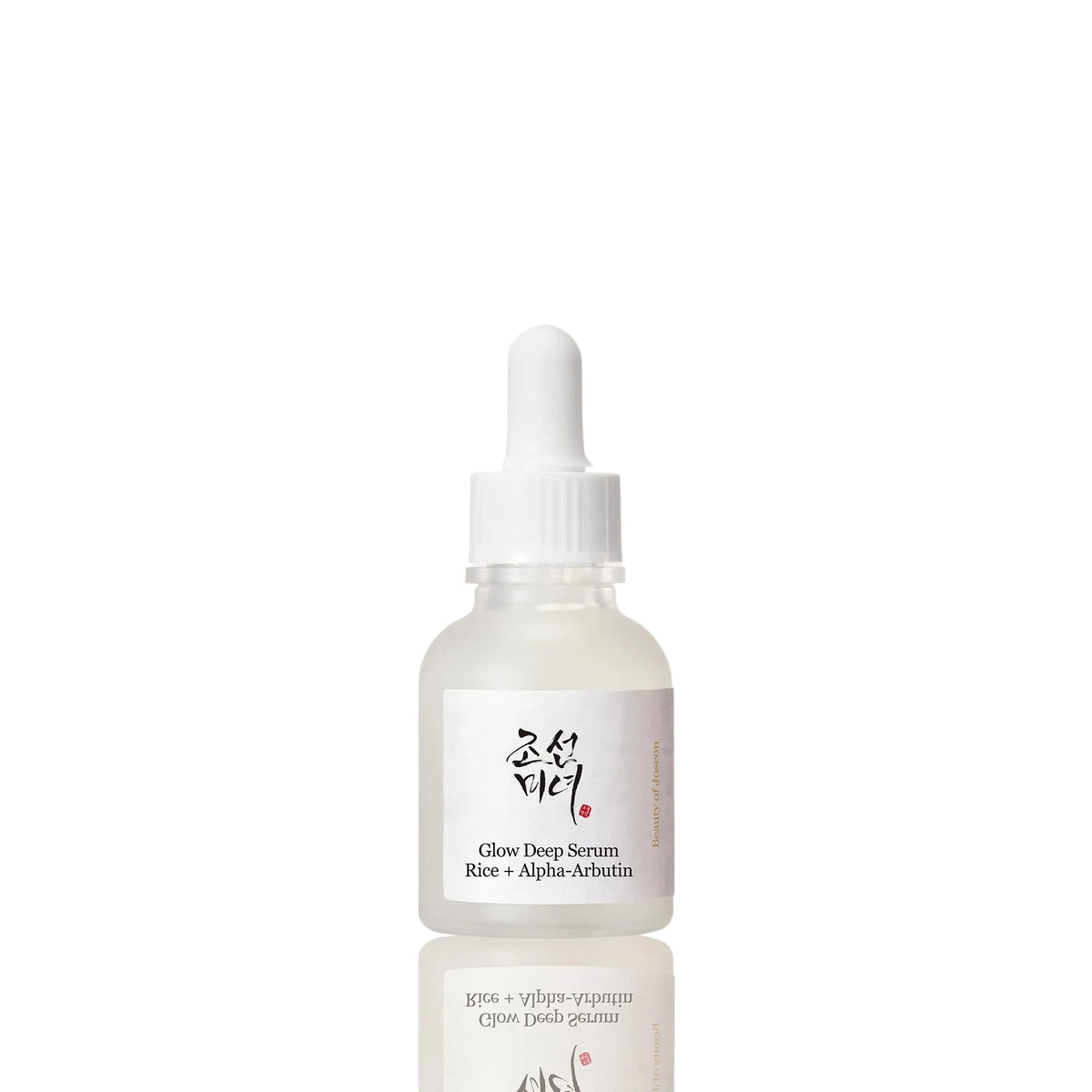A clear glass dropper bottle of Glow Deep Serum with a white label and white dropper cap, centered on a light beige background with a soft reflection below.