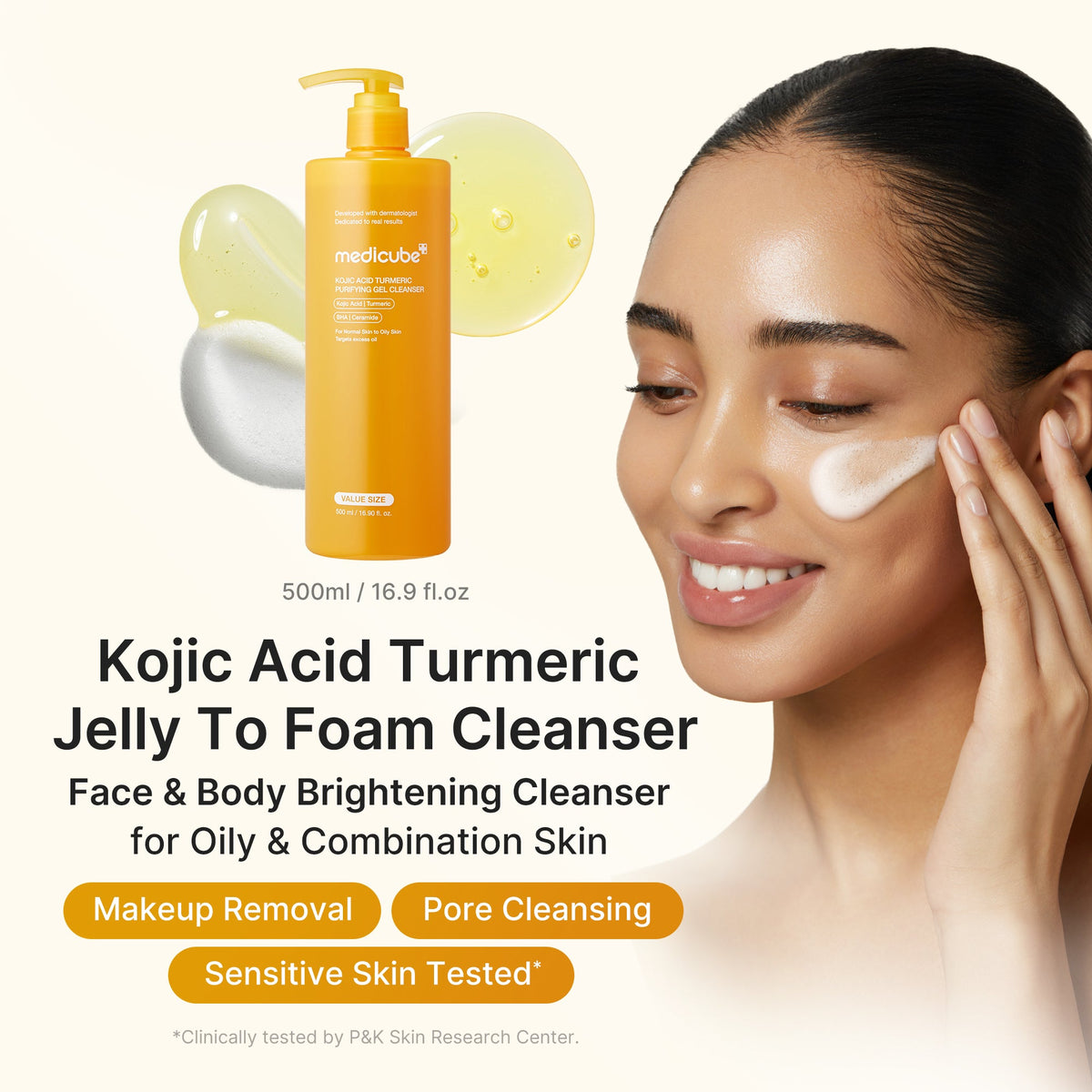 Model lathering the jelly-to-foam cleanser on her cheek, face and body brightening cleanser for oily and combination skin