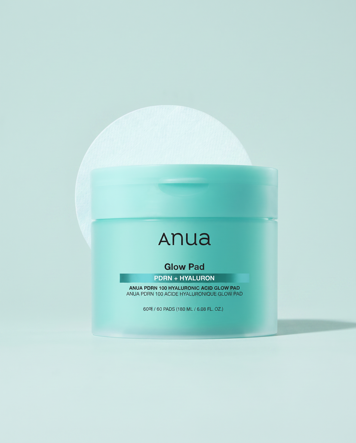 Anua PDRN 100 Hyaluronic Acid Glow Toner Pads 180ml - mint green toner pad tub on a pale mint background