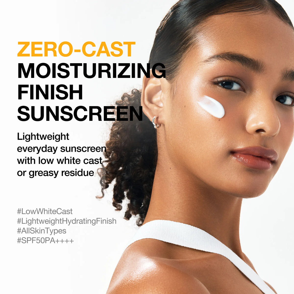 Anua Zero-Cast Sunscreen SPF50 50ml - model with a swipe of sunscreen beside a moisturizing finish panel