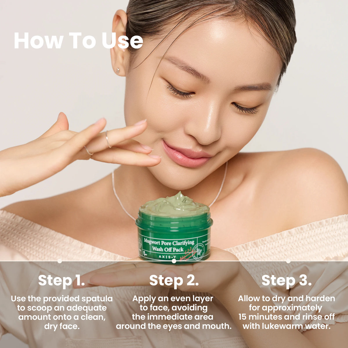 AXIS-Y Mugwort Pore Clarifying Mask 100ml - model applying the wash off pack beside a how to use panel