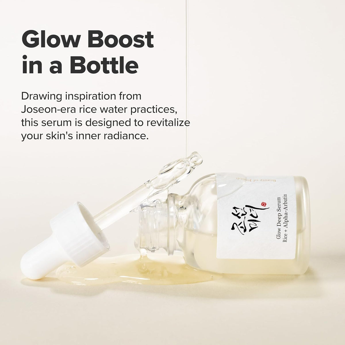 Glow boost in a bottle: the bottle lying with its dropper, inspired by Joseon-era rice water practices to revitalise inner radiance