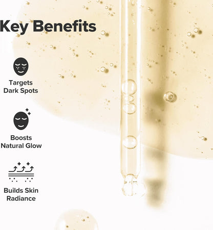 Key benefits beside a dropper over serum: targets dark spots, boosts natural glow, builds skin radiance