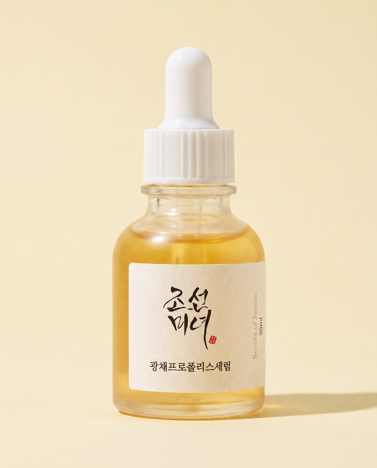 Beauty of Joseon Glow Serum Propolis + Niacinamide 30ml - amber dropper bottle, front label, pale yellow background