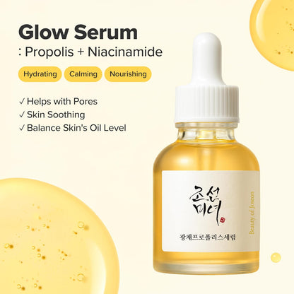 Glow Serum Propolis plus Niacinamide bottle among golden serum drops: hydrating, calming and nourishing, helps with pores and balances oil