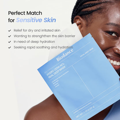 A smiling model holding the blue Hydro Cera-nol mask pack, a match for dry, irritated and sensitive skin needing barrier support and deep hydration