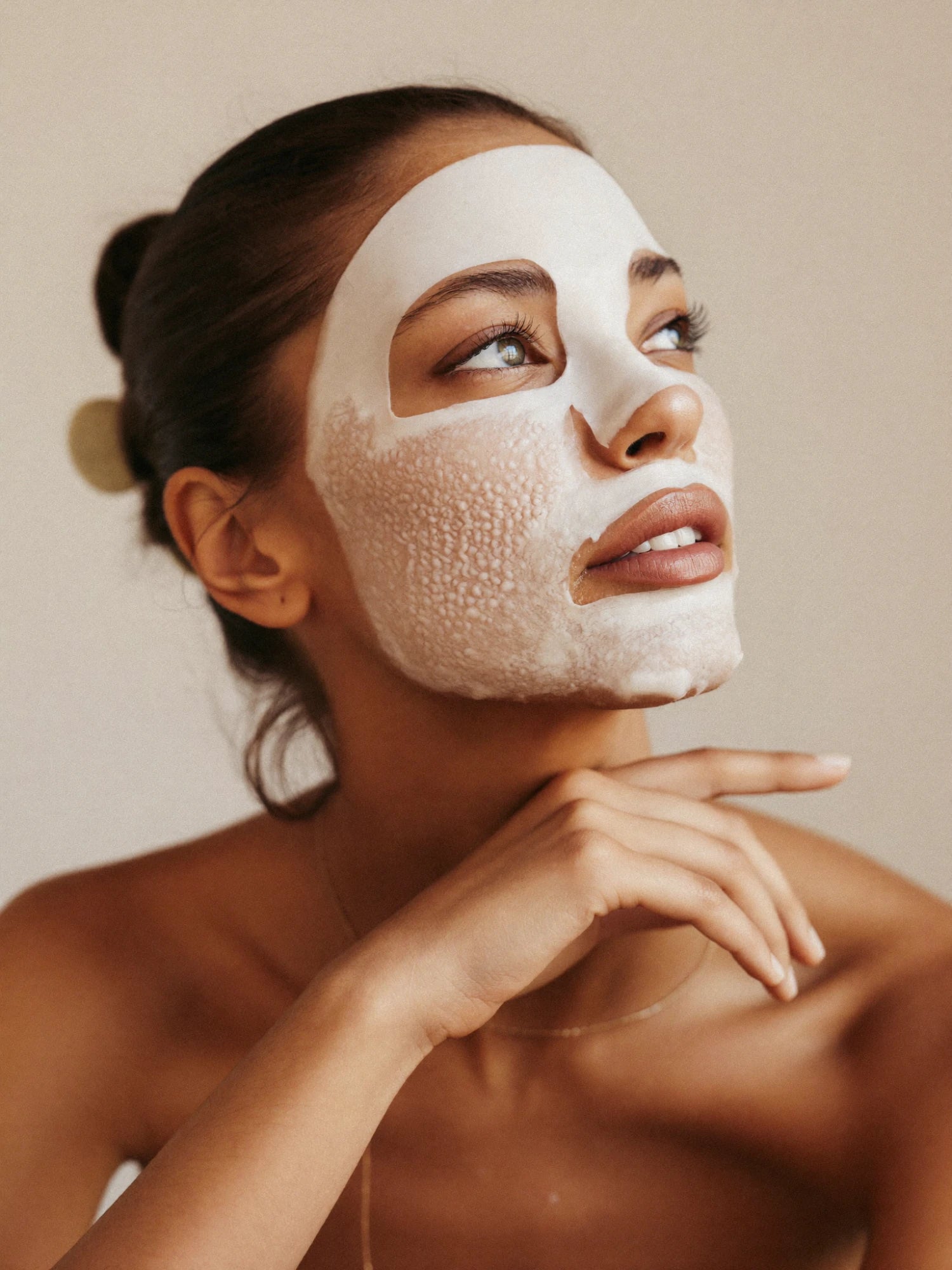 Model wearing a hydrating sheet mask