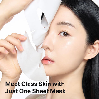 A model holding the white cream mask over her face: meet glass skin with just one sheet mask