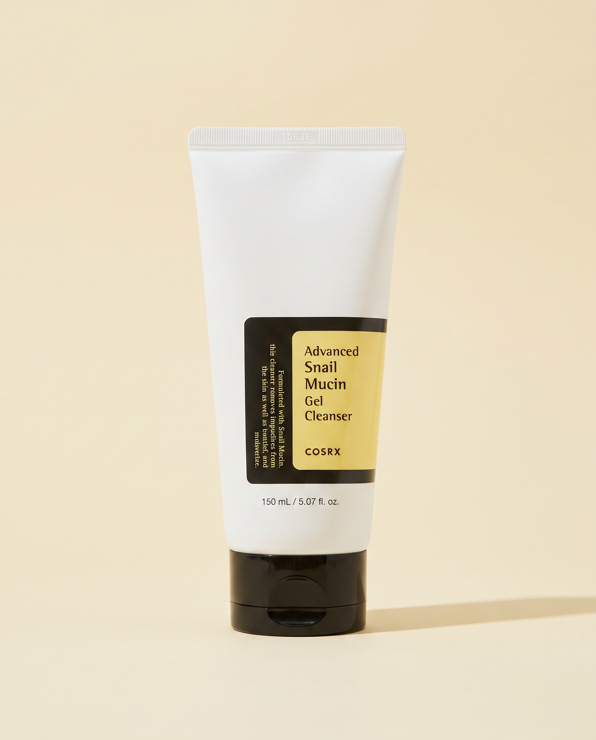 COSRX Advanced Snail Mucin Gel Cleanser 150ml - white tube with a black cap on a cream background