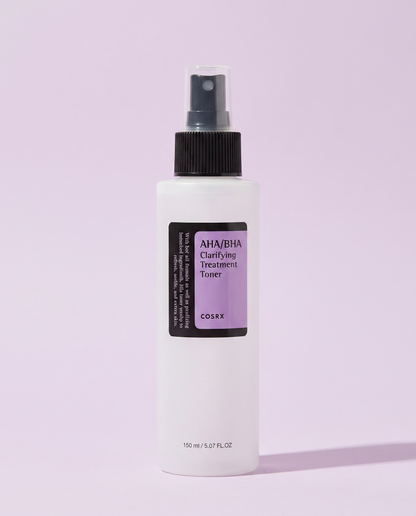 COSRX AHA BHA Clarifying Treatment Toner 150ml - clear spray bottle with a black cap on a lilac background