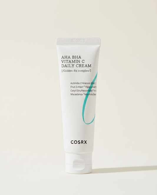 COSRX AHA BHA Vitamin C Daily Cream 50ml - white daily cream tube on a cream background