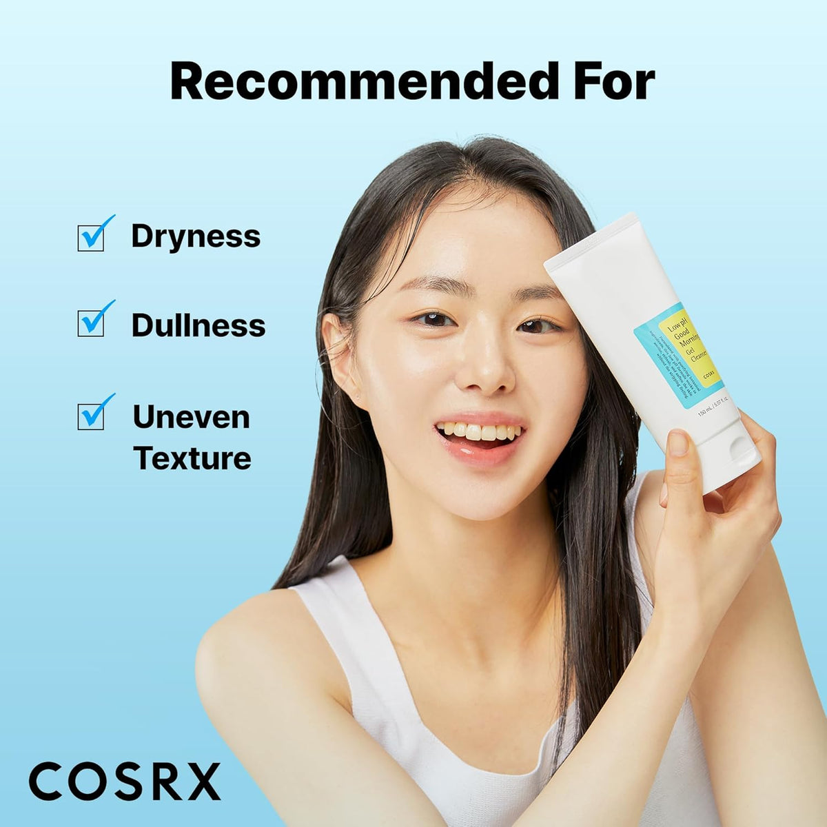 A smiling model holding the tube, recommended for dryness, dullness and uneven texture