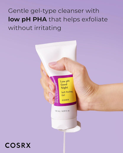 A hand squeezing the Low pH Good Night Soft Peeling Gel tube: a gentle gel cleanser with low pH PHA that exfoliates without irritating