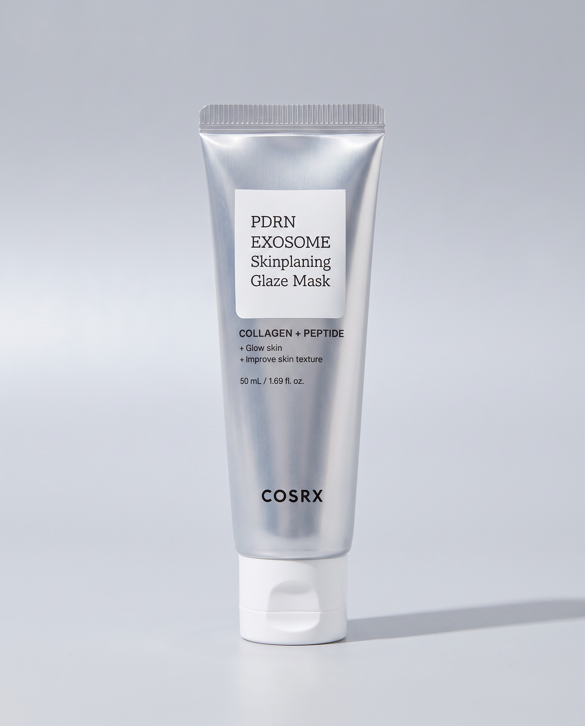 COSRX PDRN Exosome Glaze Mask 50ml - silver tube with a black cap on a grey background