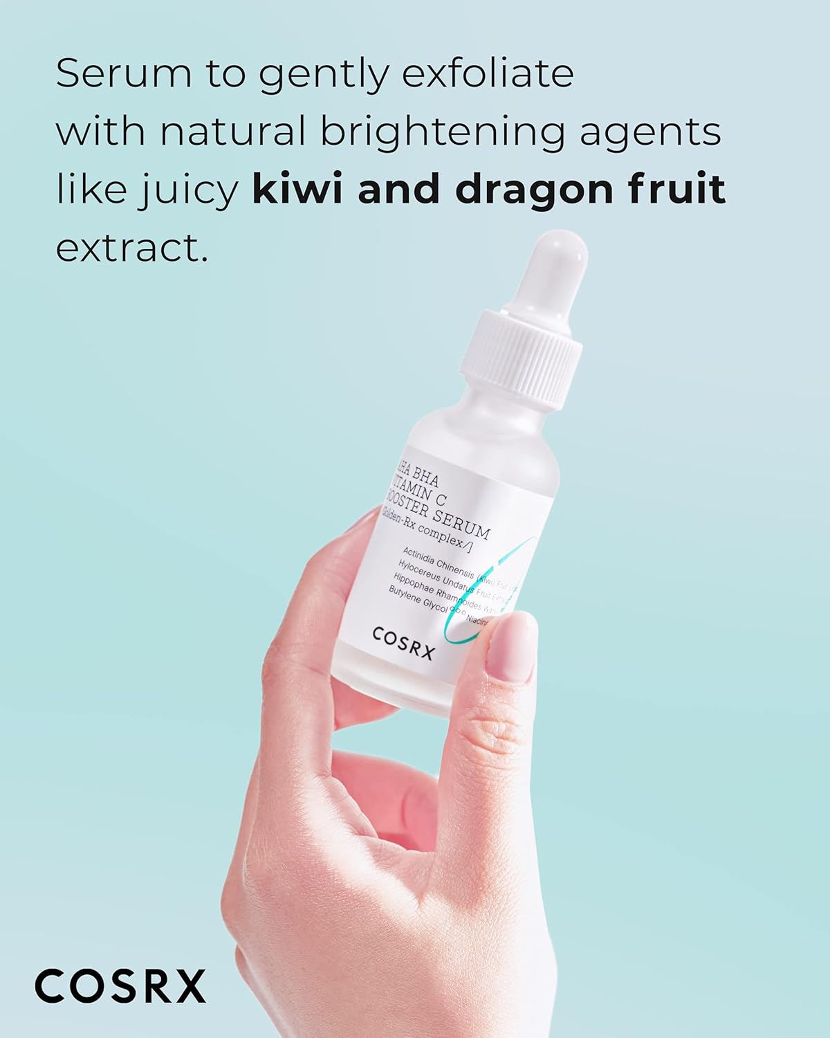 A hand holding the AHA BHA Vitamin C Booster Serum bottle: a serum to gently exfoliate with brightening kiwi and dragon fruit extract