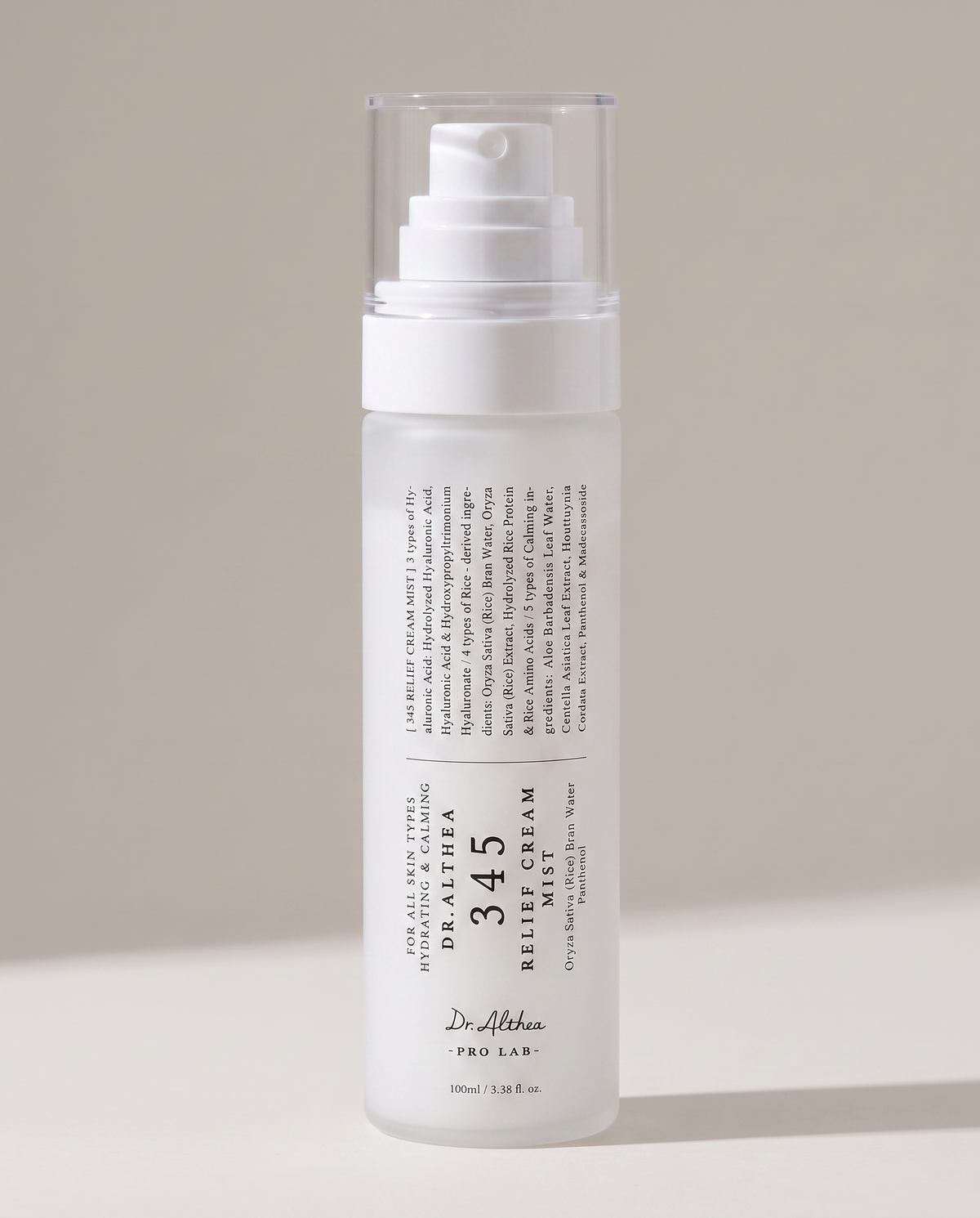 Dr.Althea 345 Relief Cream Mist 100ml - frosted pump bottle on a warm grey background