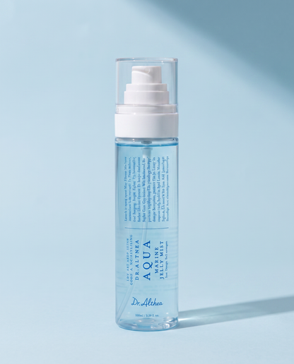 Dr.Althea Aqua Marine Jelly Mist 100ml - clear blue mist bottle angled on a blue background