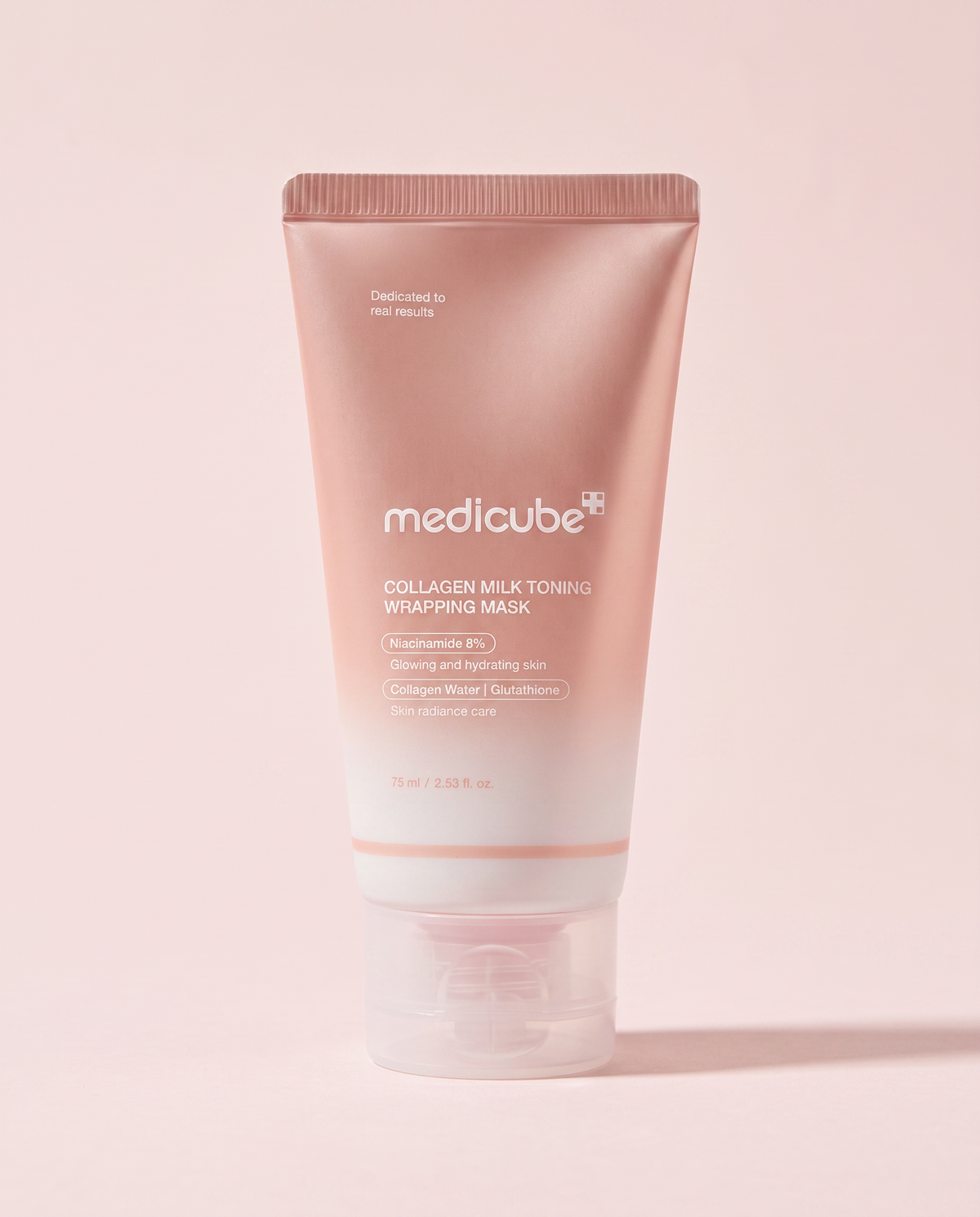 Medicube Collagen Milk Toning Wrapping Mask 75ml - pink tube upright on a pink background