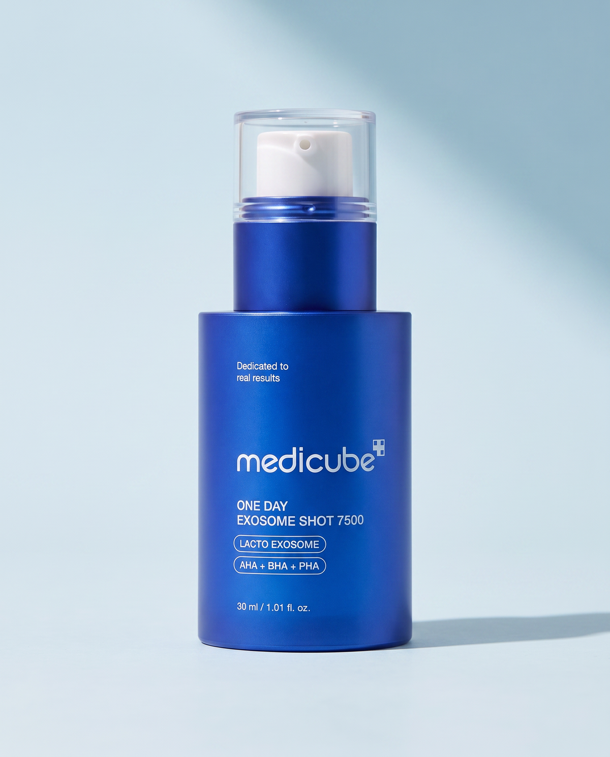 Medicube Exosome Shot Zero 7,500 PPM Serum 30ml - navy pump bottle on a pale blue background