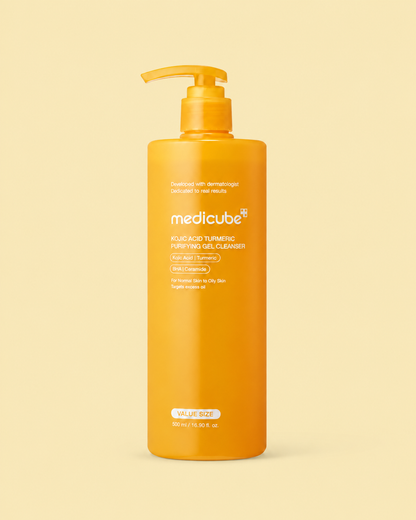 Medicube Kojic Acid Turmeric Purifying Gel Cleanser 500ml on a plain pale golden-yellow background