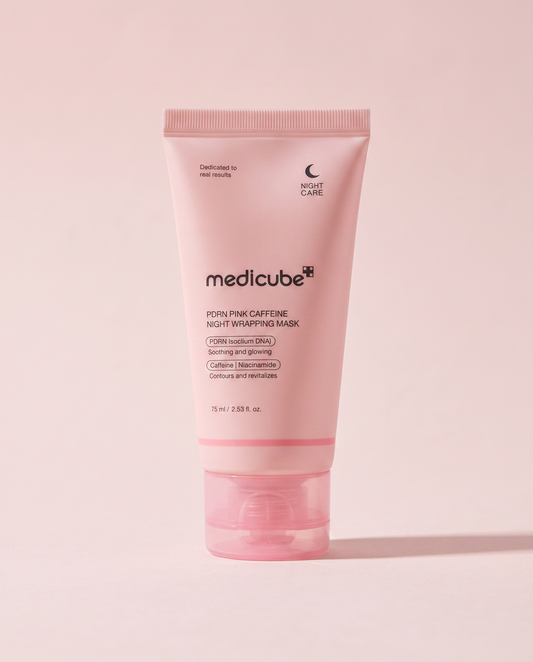 Medicube PDRN Pink Caffeine Night Wrapping Mask 75ml - pink night mask tube on a pale pink background