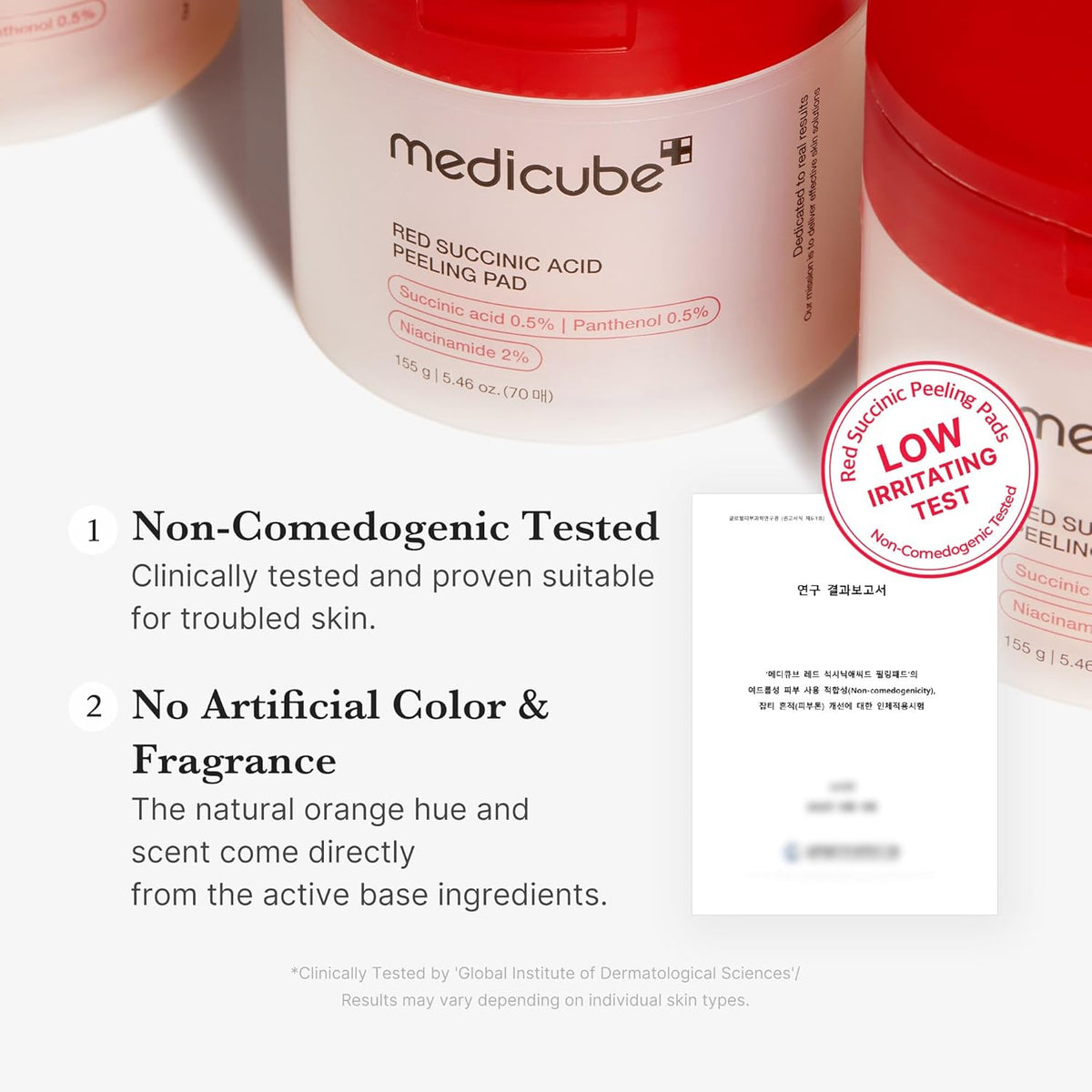 Jars beside a low-irritation test mark: non-comedogenic tested, no artificial colour or fragrance, the orange hue comes from the active ingredients