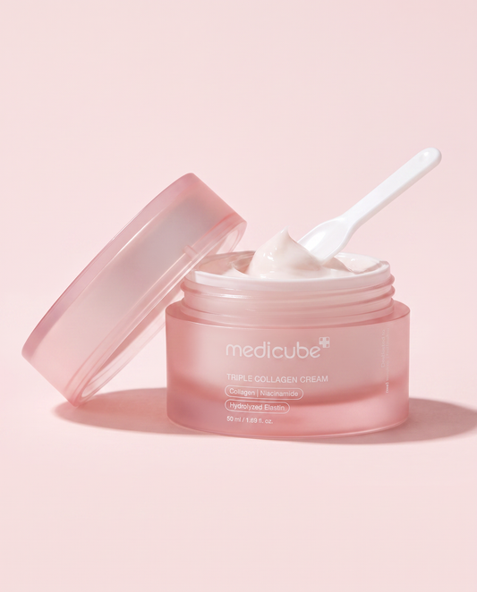 Medicube Triple Collagen Cream 50ml - open pink jar with a spatula and the lid beside it