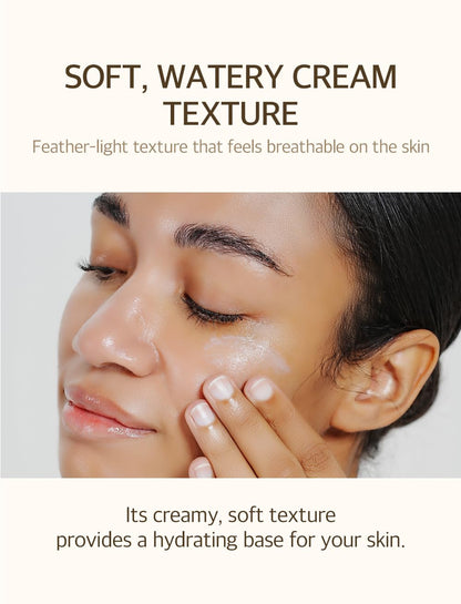 Soft watery cream texture: a model with sunscreen on her cheek, a feather-light texture that feels breathable