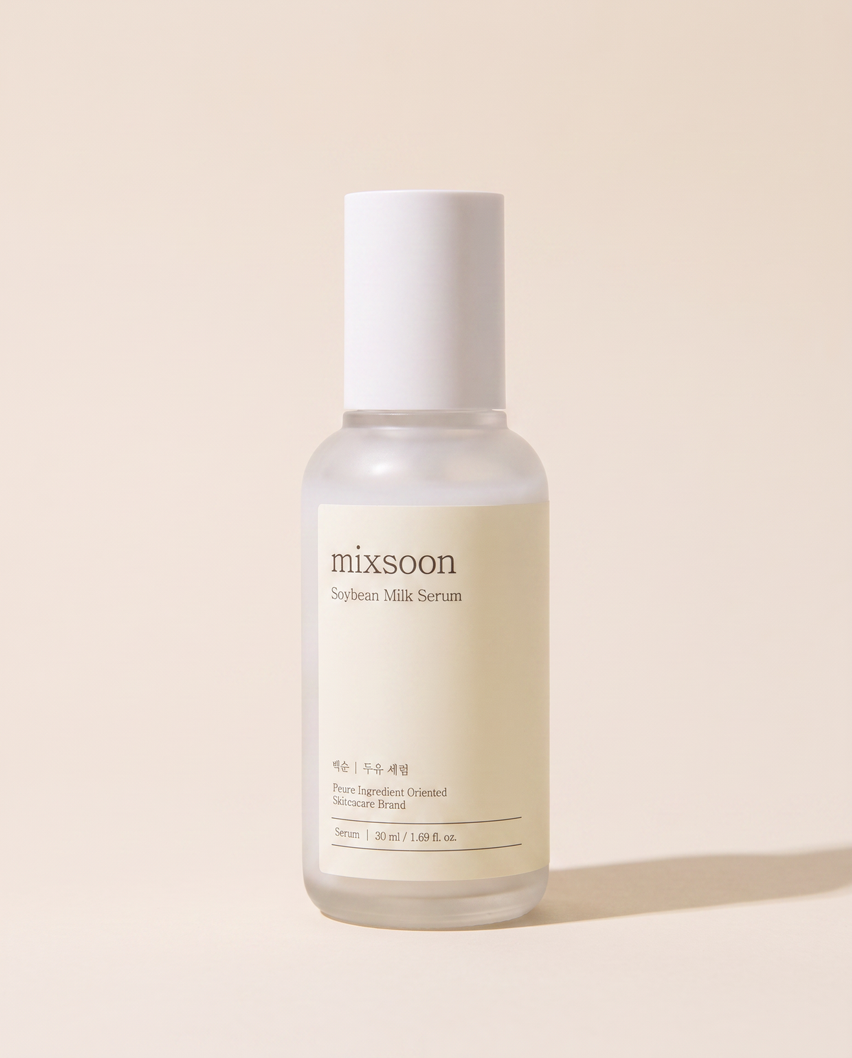 Mixsoon Soybean Milk Serum 50ml - cream serum pump bottle upright, beige background