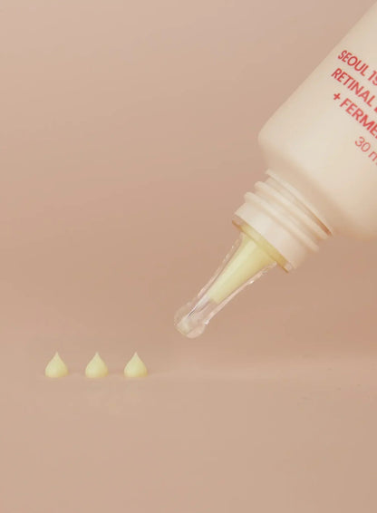 Seoul 1988 Retinal Liposome 4% Eye Cream 30ml - tube tip dispensing three drops of the pale serum