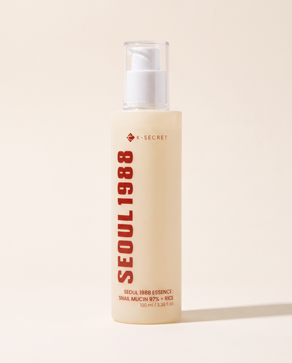Seoul 1988 Snail Mucin Essence 100ml - cream pump bottle with red lettering on a beige background