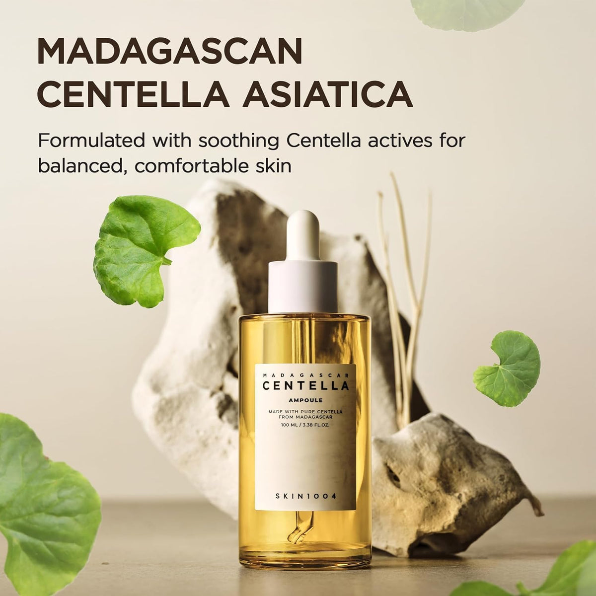 The ampoule bottle on stones with centella leaves, formulated with soothing Madagascan centella asiatica actives
