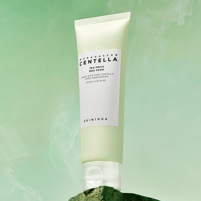 SKIN1004 Madagascar Centella Tea-Trica BHA Foam 125ml on a coloured background