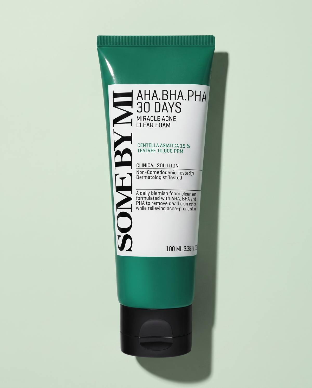 Some By Mi AHA BHA PHA Miracle Acne Foam 100ml - dark green cleanser tube on a pale green background
