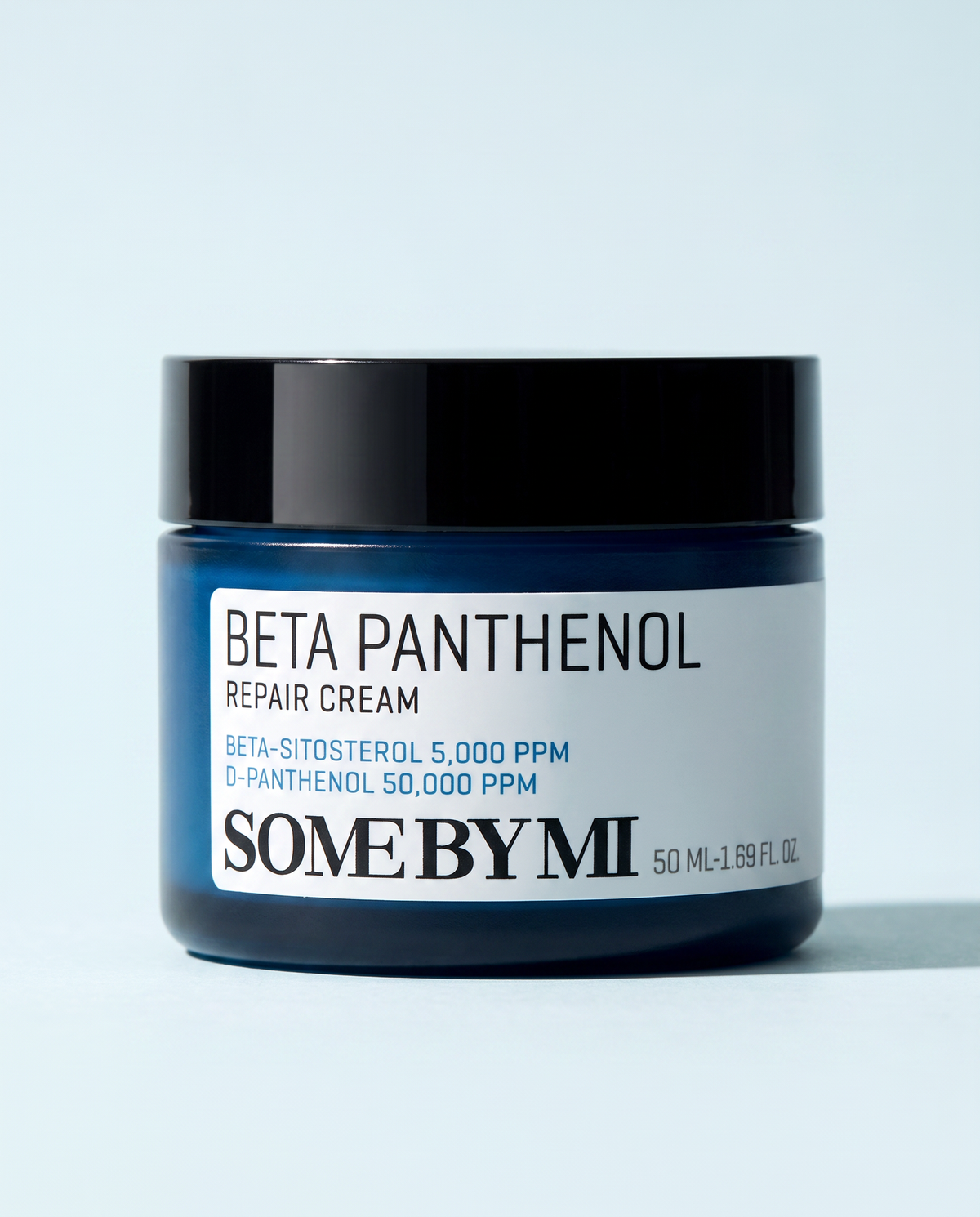 Some By Mi Beta Panthenol Repair Cream 50ml - navy jar with a black lid on a pale blue background