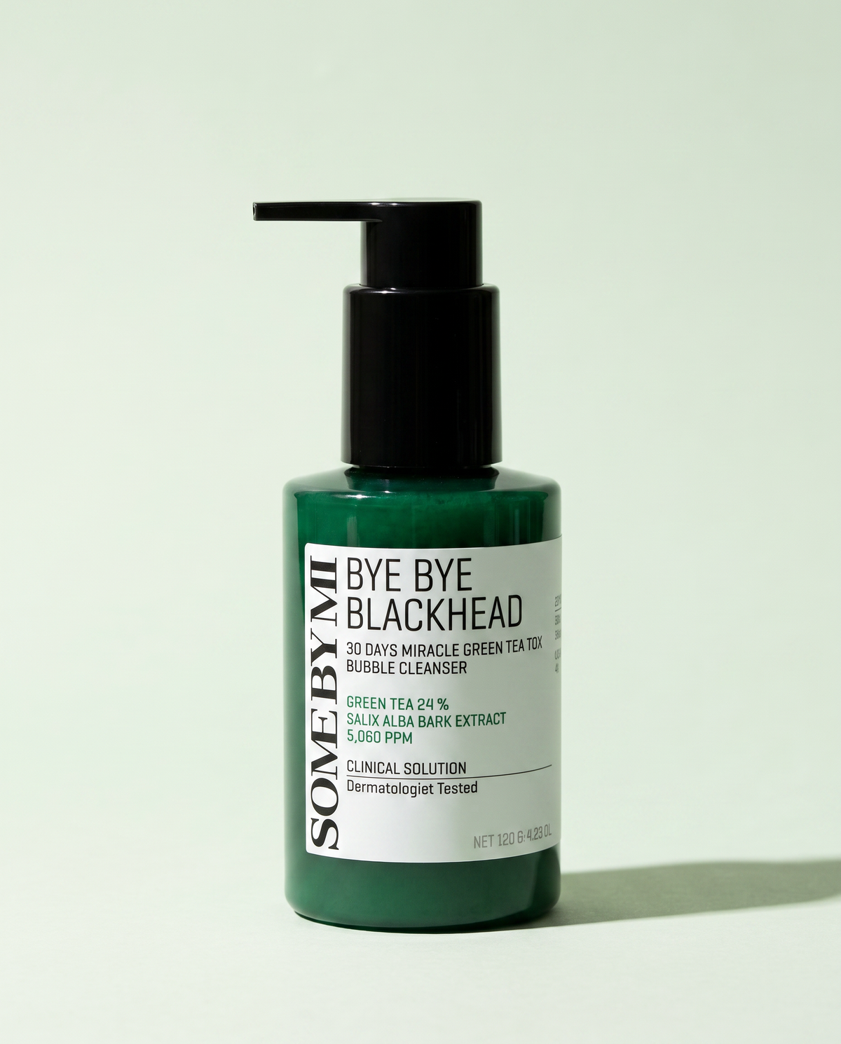 Some By Mi Green Tea Tox Bubble Cleanser 120g - dark green pump cleanser bottle, mint background