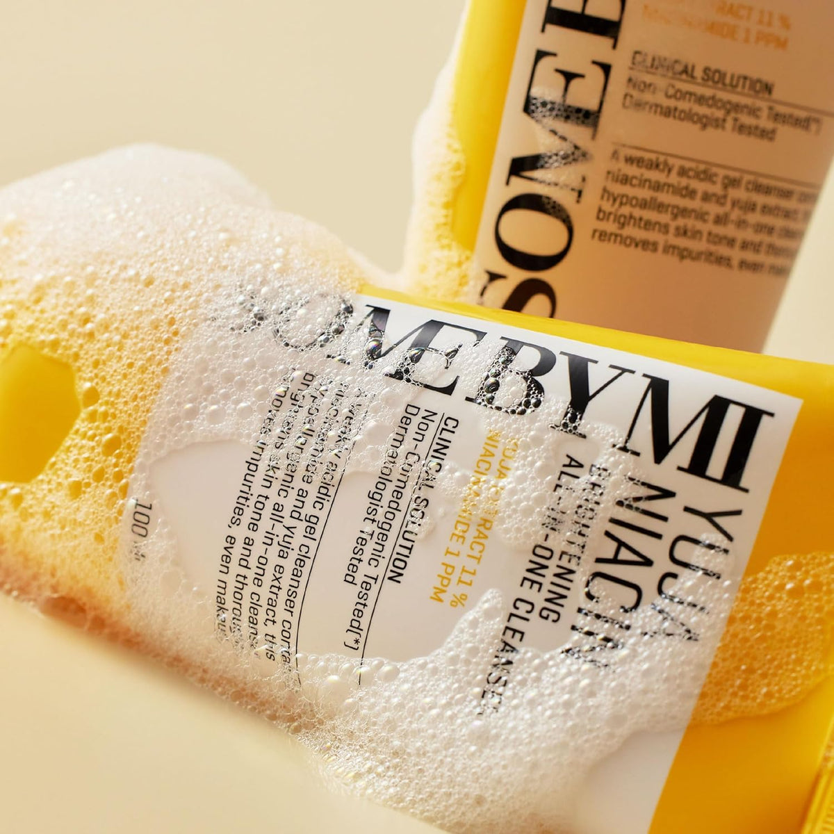 A close-up of the yellow tube lying in white foam
