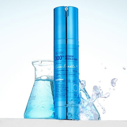 VT Cosmetics Hydrop Reedle Shot 300hL 50ml standing beside a beaker of splashing blue liquid on a white lab-style set