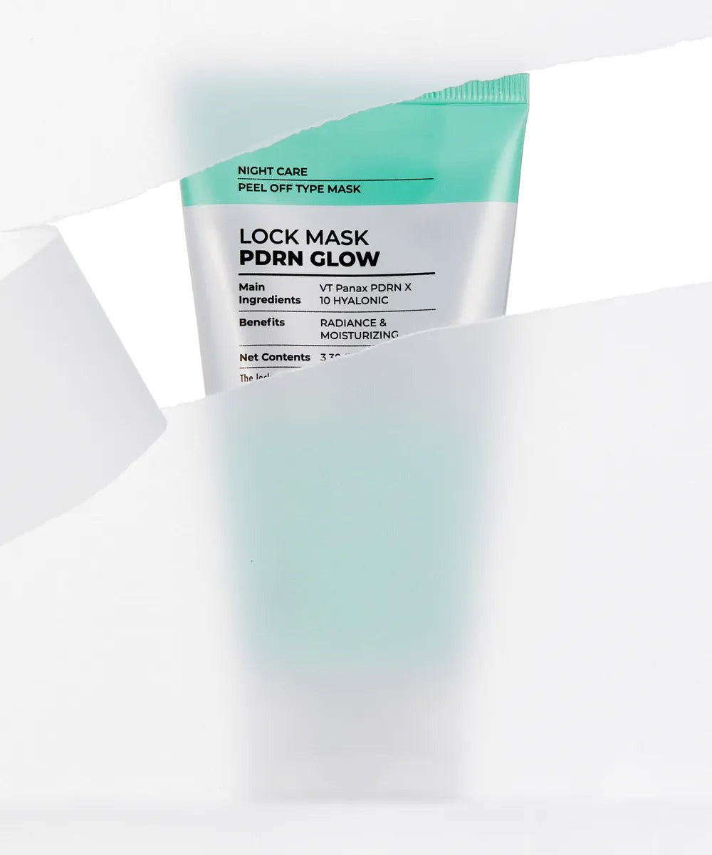 VT Cosmetics PDRN Glow Lock Mask 100ml tube revealed behind torn white paper, showing the Lock Mask PDRN Glow label