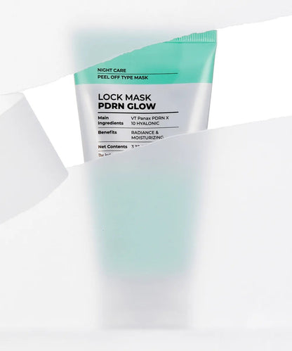 VT Cosmetics PDRN Glow Lock Mask 100ml tube revealed behind torn white paper, showing the Lock Mask PDRN Glow label